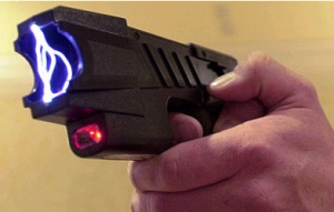 Picture of a Taser being discharged.